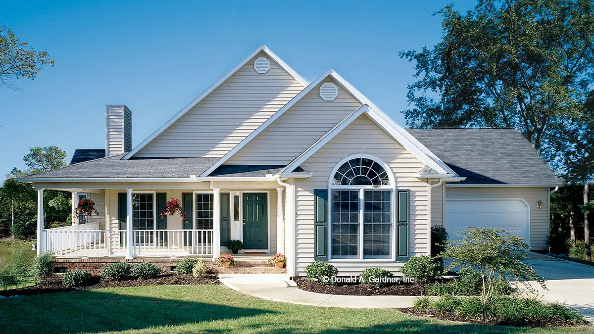 This is a photograph of the front of simple house plan 350 The Brennan as built by a customer