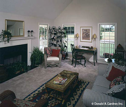 This is a photograph of the rear windows in great room of simple house plan 350 The Brennan as built by a customer