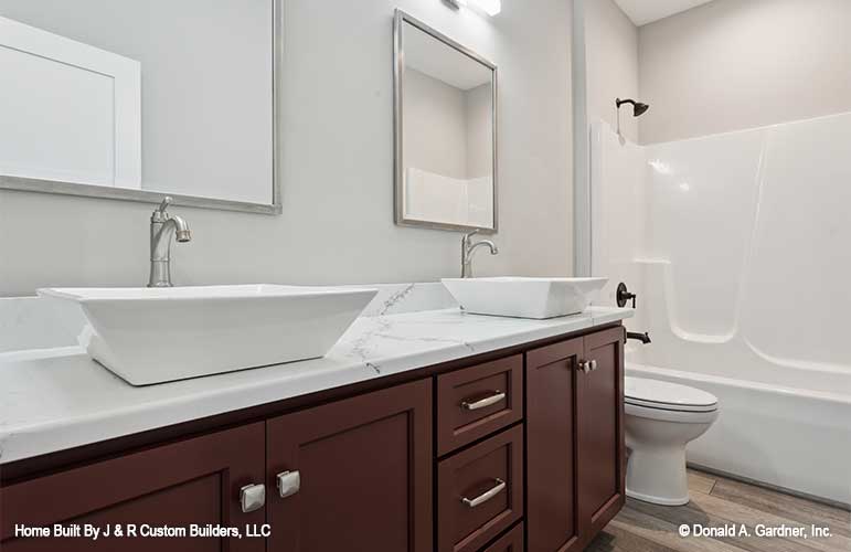 Double sink vanity and shower tub combination. The Brielle plan 1233.