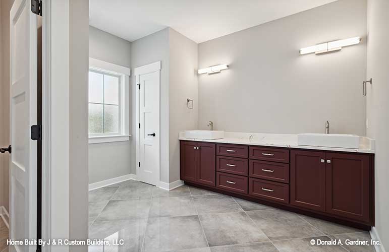 Double sink vanity in the master bathroom. The Brielle plan 1233.