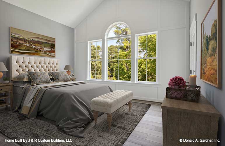 Triple windows in the master bedroom.The Brielle plan 1233.