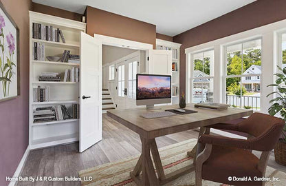 French doors and built in bookcases in the study. The Brielle plan 1233.