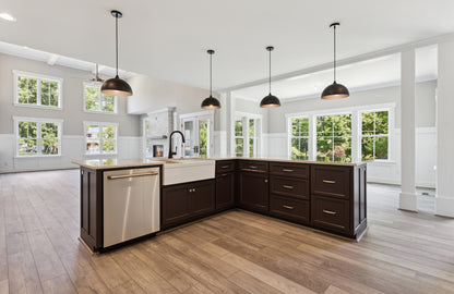 Kitchen island with sink and dishwasher. The Brielle plan 1233.