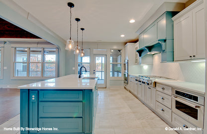 Kitchen with island picture for house plan 1340 The Brodie