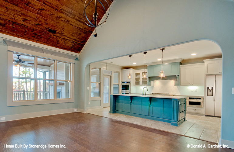 Great room view into kitchen picture for house plan 1340 The Brodie