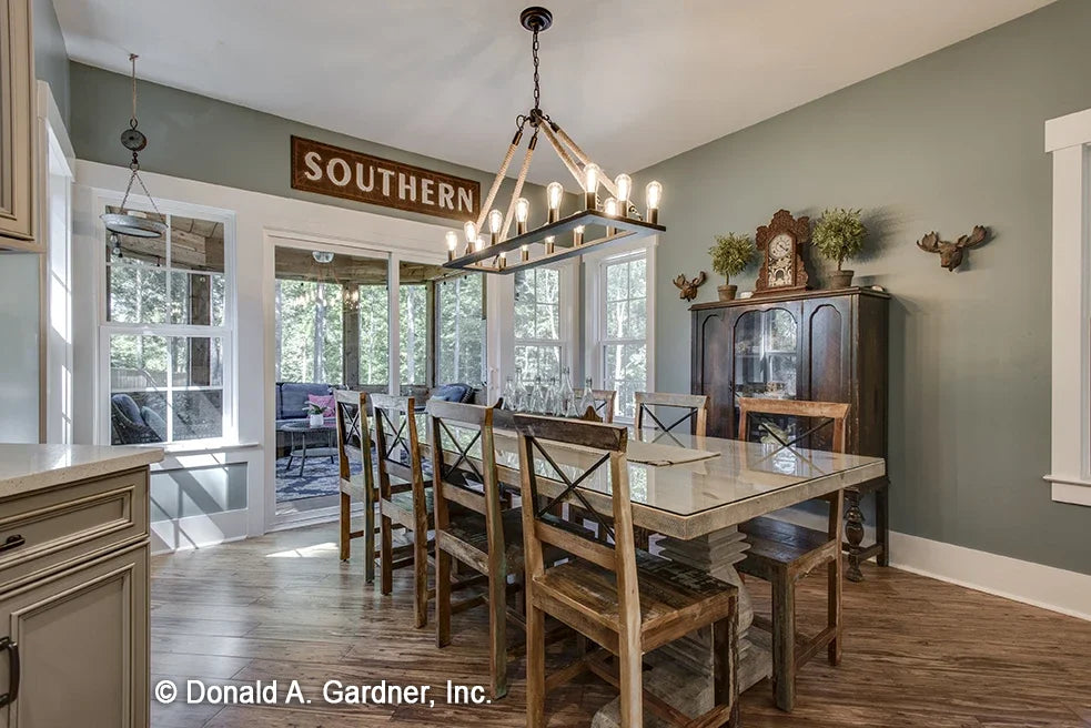 Dinning area with views out to the screened porch