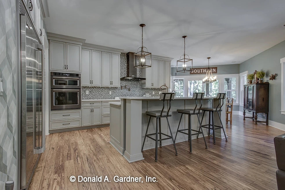 Kitchen view, barstool seating.