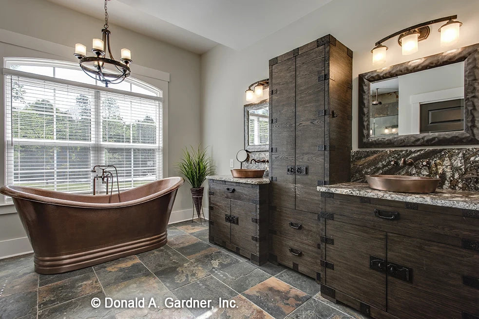 Master bathroom featuring very unusual cabinets and copper soaking tub