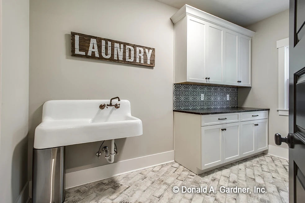 Laundry room with lots of counter space and huge utility sink