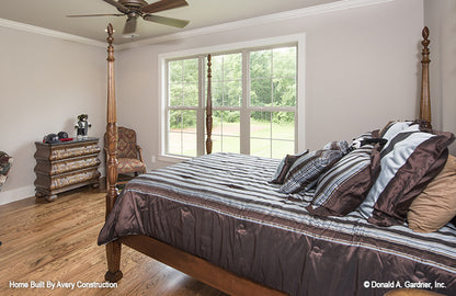 This is a picture of the bedroom of the traditional house plan 1141 The Calypso