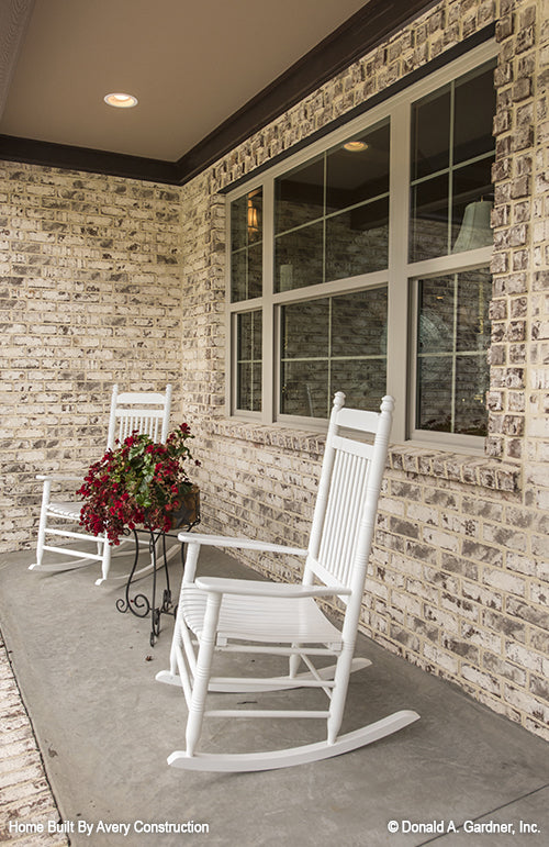 This is a picture of the front porch of the traditional house plan 1141 The Calypso