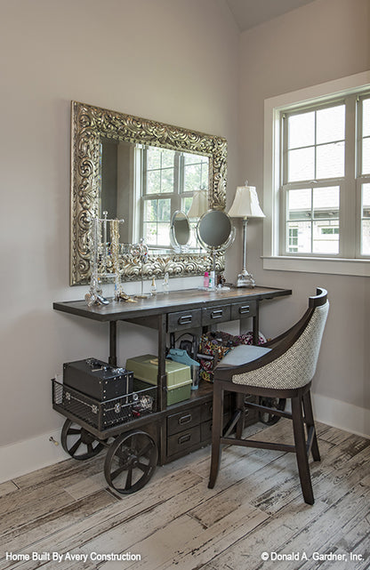 This is a picture of the master bathroom vanity area of the traditional house plan 1141 The Calypso