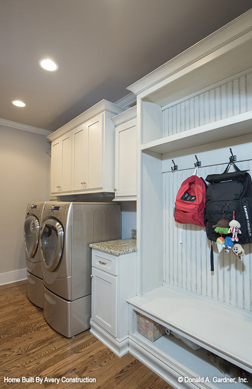 This is a picture of the utility room of the traditional house plan 1141 The Calypso