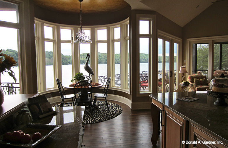 Curved wall with windows in the breakfast room. The Capistrano plan 1227.