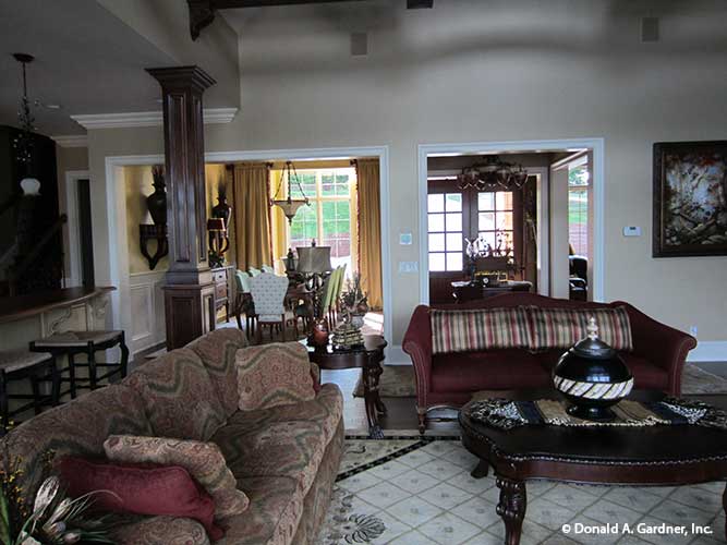 Great room view into the dining room off to the side. The Capistrano plan 1227.