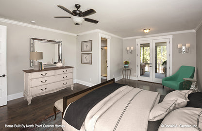 This is a master bedroom picture of the front of one story house plan 1180 The Carinthia