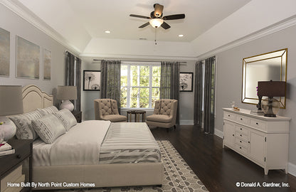 This is a master bedroom with windows picture of the front of one story house plan 1180 The Carinthia