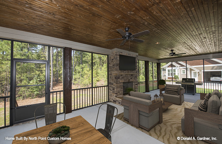 This is a screened porch picture of the front of one story house plan 1180 The Carinthia