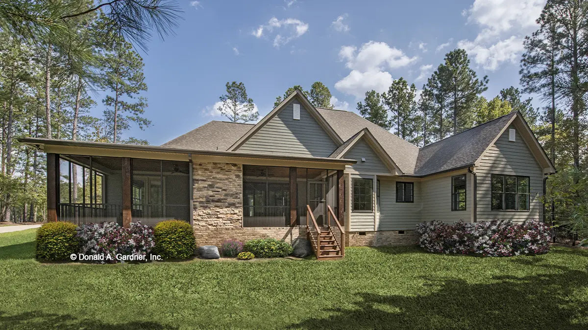 This is a photograph of the rear of four bedroom house plan 1180 The Carinthia as built by a customer