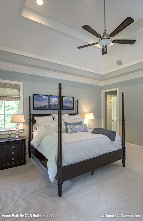 Tray ceiling and recessed lighting in the bedroom. The Carrera plan 1178.