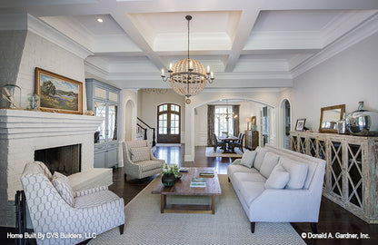 Full view of the living room with the foyer and dining room off to the side. The Carrera plan 1178.