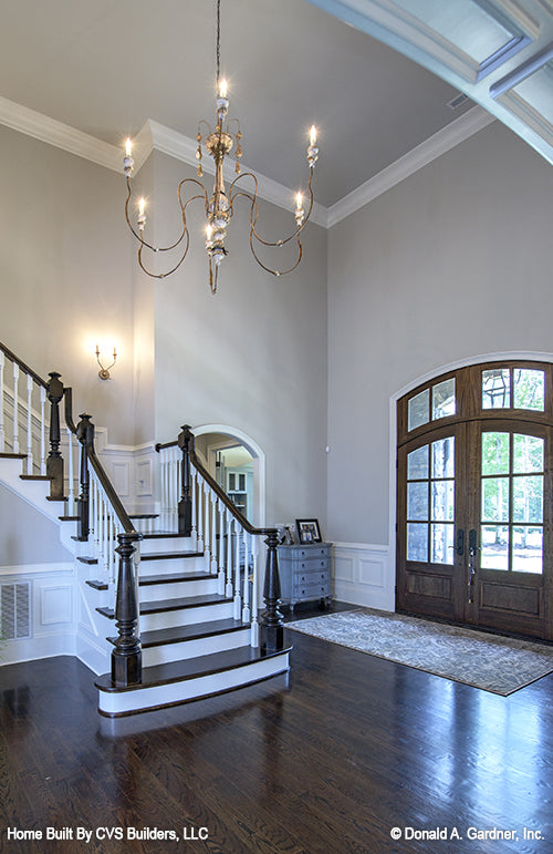 Chandelier over the staircase in the foyer. The Carrera plan 1178.