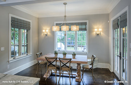 Glass French patio doors in the breakfast room. The Carrera plan 1178.