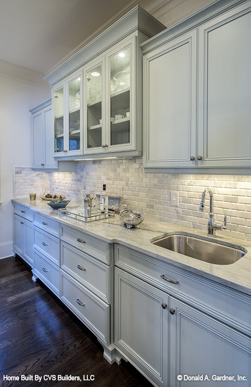 Tile backsplash and sink the butler's pantry. The Carrera plan 1178. 