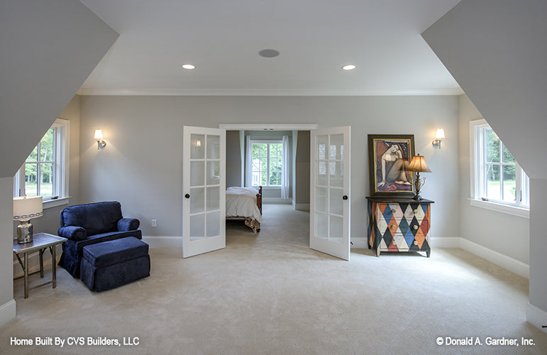 Sitting area with glass French doors. The Carrera plan 1178.