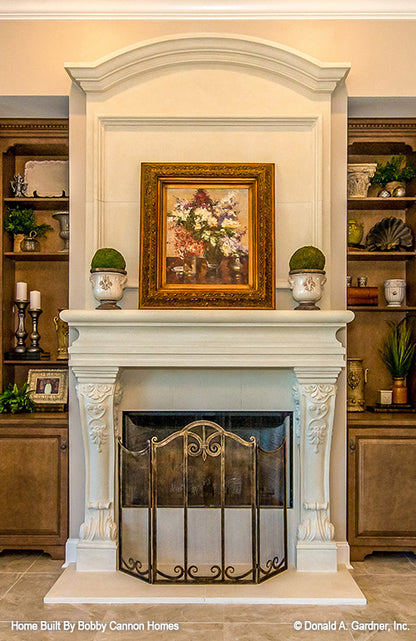 Elegant fireplace in the great room. The Cedar Court plan 5004.