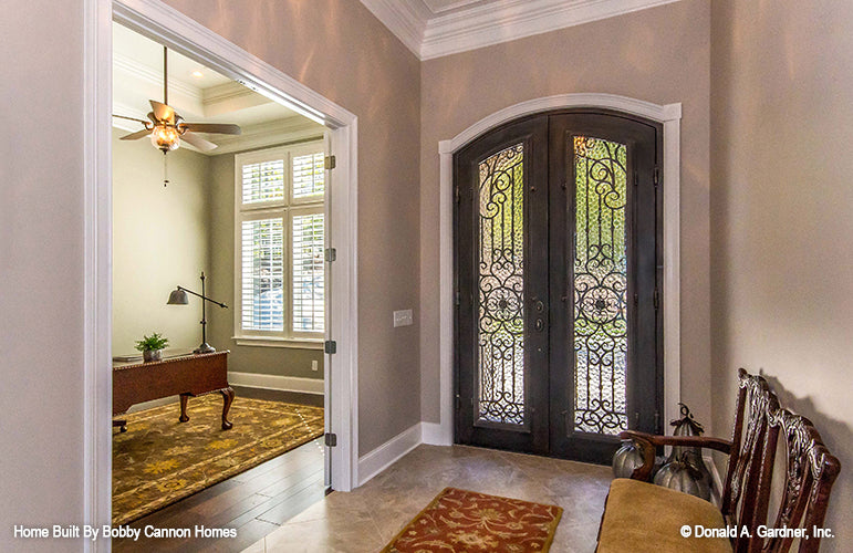 Arched entry door in the foyer. The Cedar Court plan 5004.