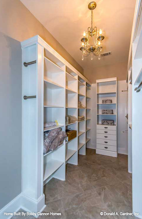 Shelves and drawers in the master closet. The Cedar Court plan 5004.