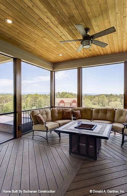 Stained wood panels on flat ceiling in the screened in porch. The Cedar Creek plan 959 