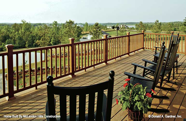 This is a picture of the rear deck view for walkout basement house plan 1125 The Cedar Ridge