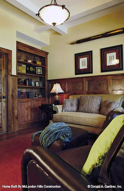 This is a picture of the study with bookcases for walkout basement house plan 1125 The Cedar Ridge