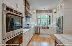 Open kitchen picture showing sink and window for one story house plan 1323 The Celeste
