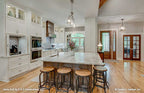 Kitchen seating and island pictured for one story house plan 1323 The Celeste