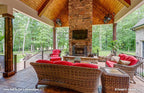Rear porch picture with fireplace for one story house plan 1323 The Celeste