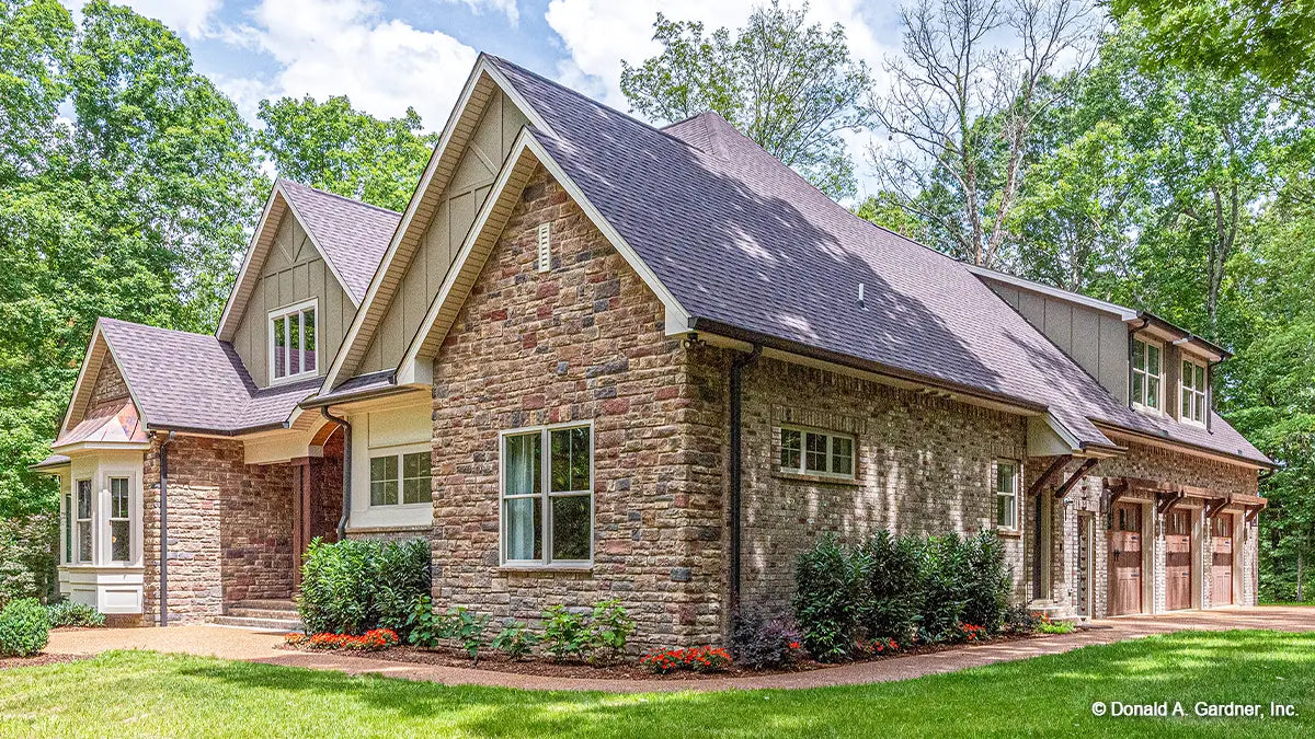 This is a photograph of the side of four bedroom house plan 1323 The Celeste as built by a customer