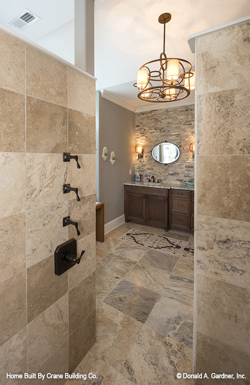 Master bathroom shower of luxury house plan 1253 The Chamberlaine