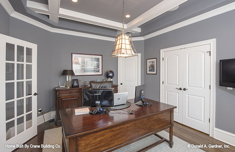 Study room picture with coffered ceiling detail of luxury house plan 1253 The Chamberlaine