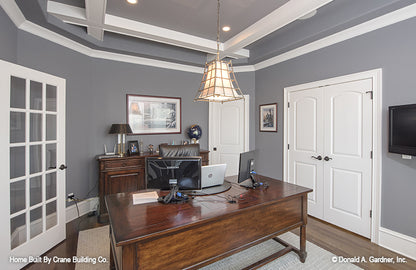 Study room picture with coffered ceiling detail of luxury house plan 1253 The Chamberlaine