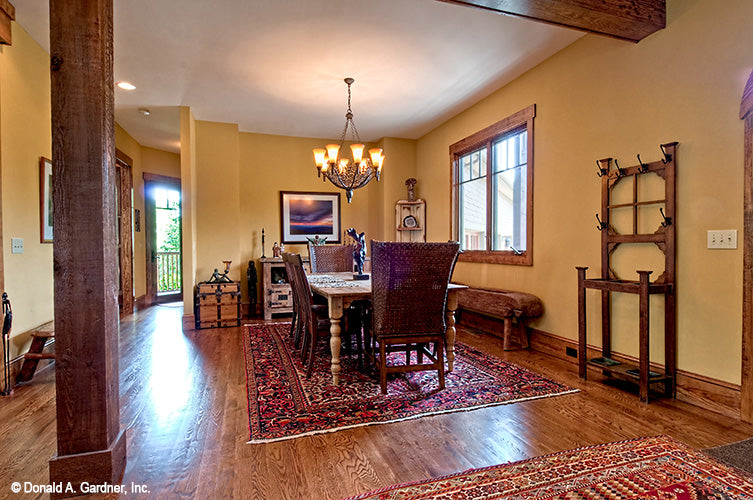 Flat ceiling and wood floors in the dining room. The Chanticleer plan 810.