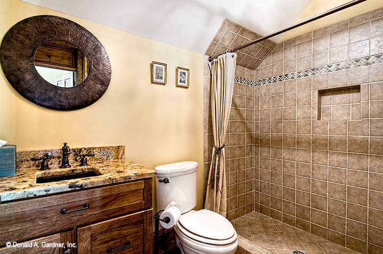 Tiled walk-in shower in the bathroom. The Chanticleer plan 810.