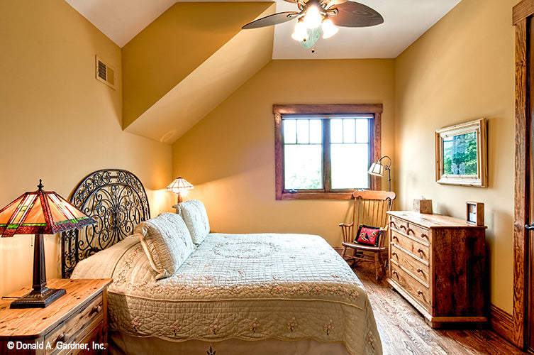 Wood floors in the bedroom. The Chanticleer plan 810.