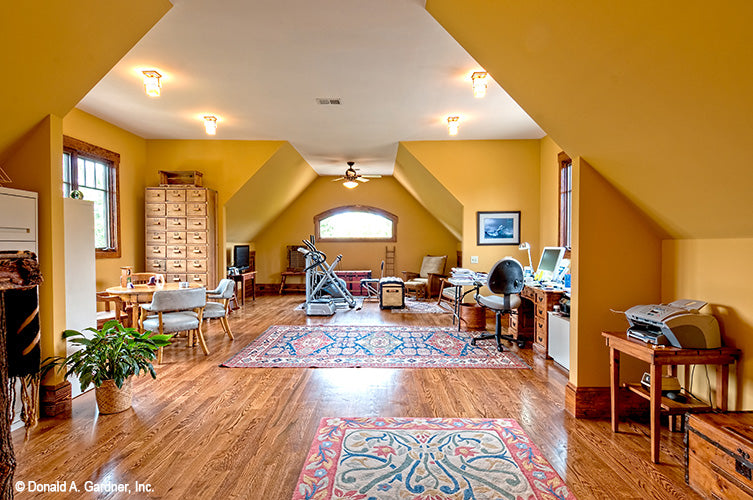 Wood flooring in the bonus room. The Chanticleer plan 810.