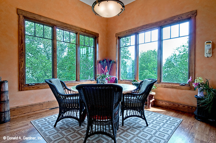 Triple windows on both walls surrounding the breakfast room. The Chanticleer plan 810.