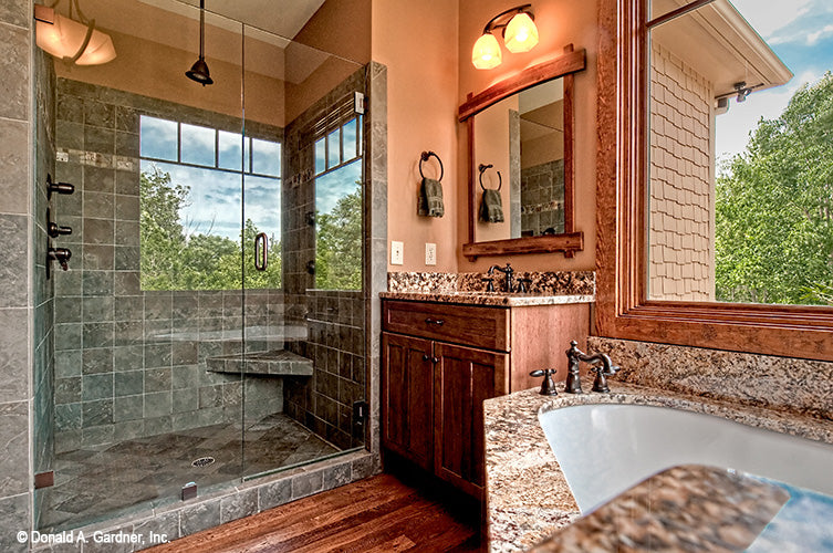 Tiled walk-in shower in master bathroom. The Chanticleer plan 810.