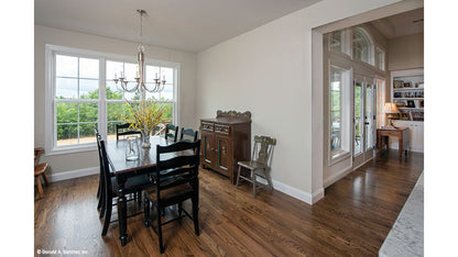 Triple window and chandelier in the breakfast room. The Charlevoix plan 1068,