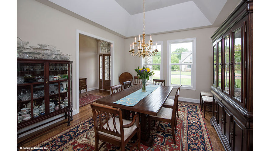 Tray ceiling and chandelier in the dining room. The Charlevoix plan 1068,